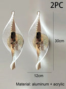 Ljojo Modern Acrylic Gold/Black LED Wall Sconce for Home Decor & Interior Lighting.