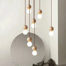 Travertine Pendant Lamp Stone Chandelier with Glass Ball - Luxurious Hanging Light for Bedroom by Ljojo