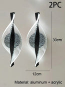 Ljojo Modern Acrylic Gold/Black LED Wall Sconce for Home Decor & Interior Lighting.