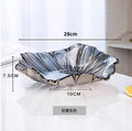 Ljojo Melon Seed & Fruit Plate Set on Crystal Glass Coffee Table