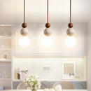 Travertine Pendant Lamp Stone Chandelier with Glass Ball - Luxurious Hanging Light for Bedroom by Ljojo