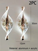 Ljojo Modern Acrylic Gold/Black LED Wall Sconce for Home Decor & Interior Lighting.