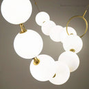 Ljojo Luxury Pendant Light: Necklace Shape Chandelier with White Glass Ball