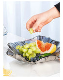 Ljojo Melon Seed & Fruit Plate Set on Crystal Glass Coffee Table